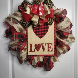 Valentines Day Red and gold wreath hanging on a white door in Myrtle Beach SC